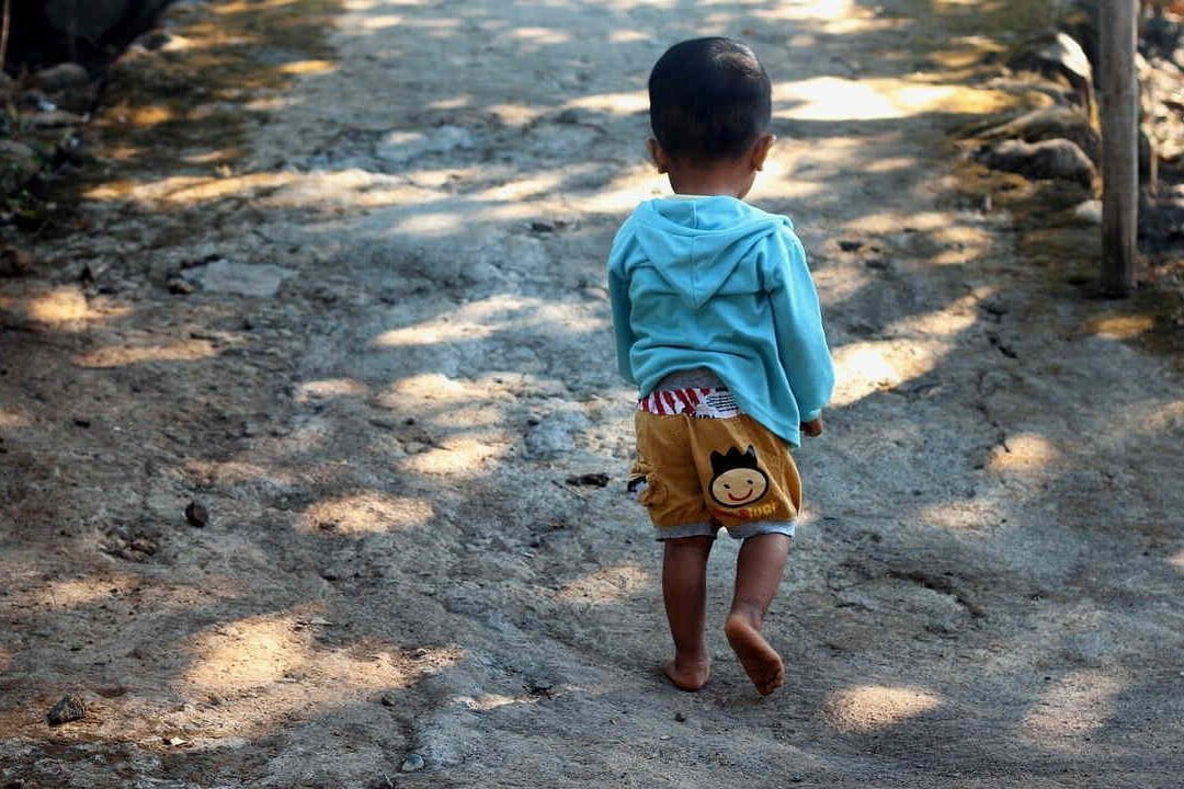 A child walking alone
