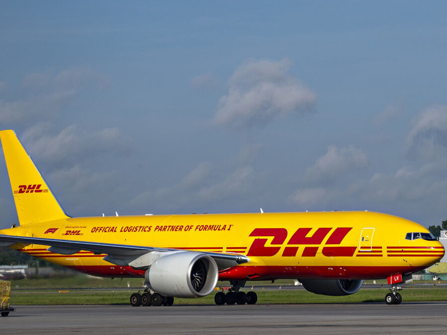 The first DHL x Formula One co-branded Boeing 777 landing at Changi Airport, Singapore